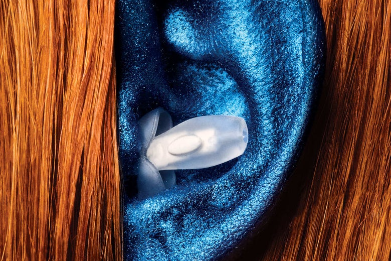 Closeup of a Happy Ears earplug in a woman's ear.